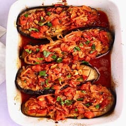 Imam bayildi with BBQ lamb & tzatziki